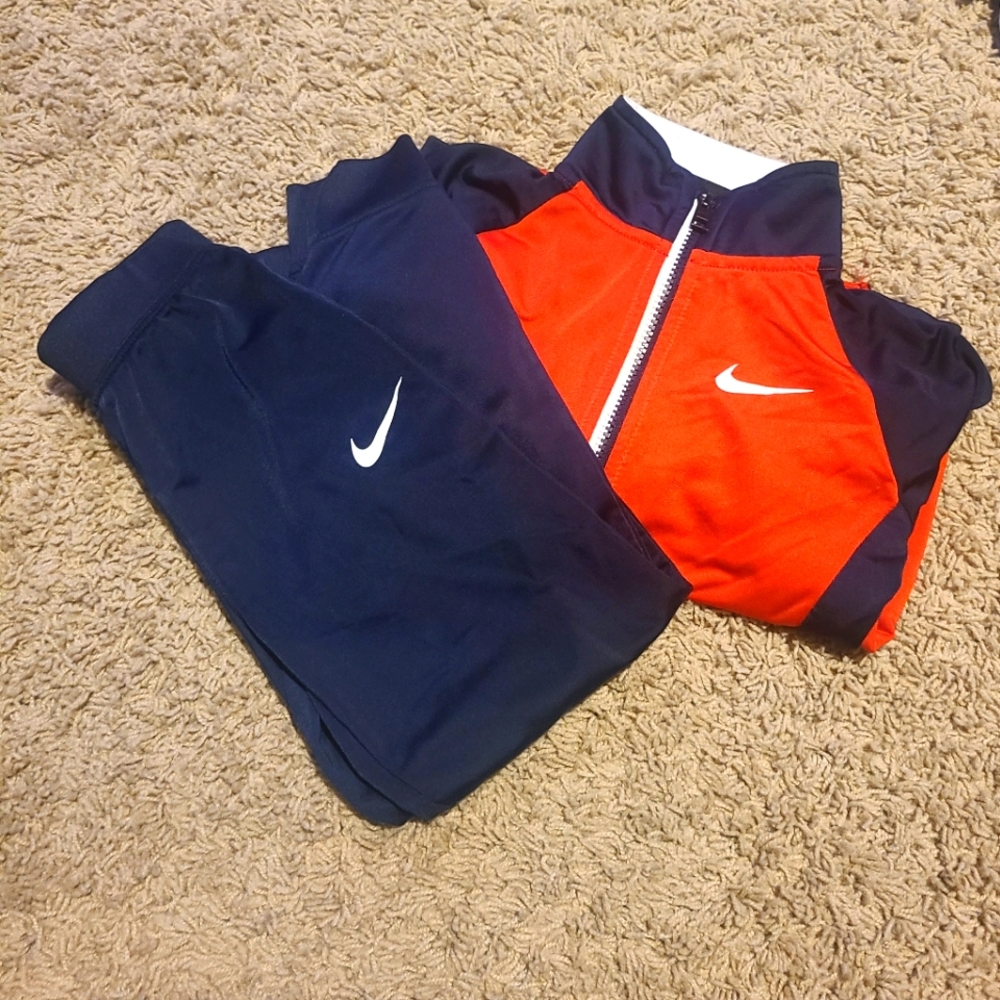 Boys red/blue Nike track suit
